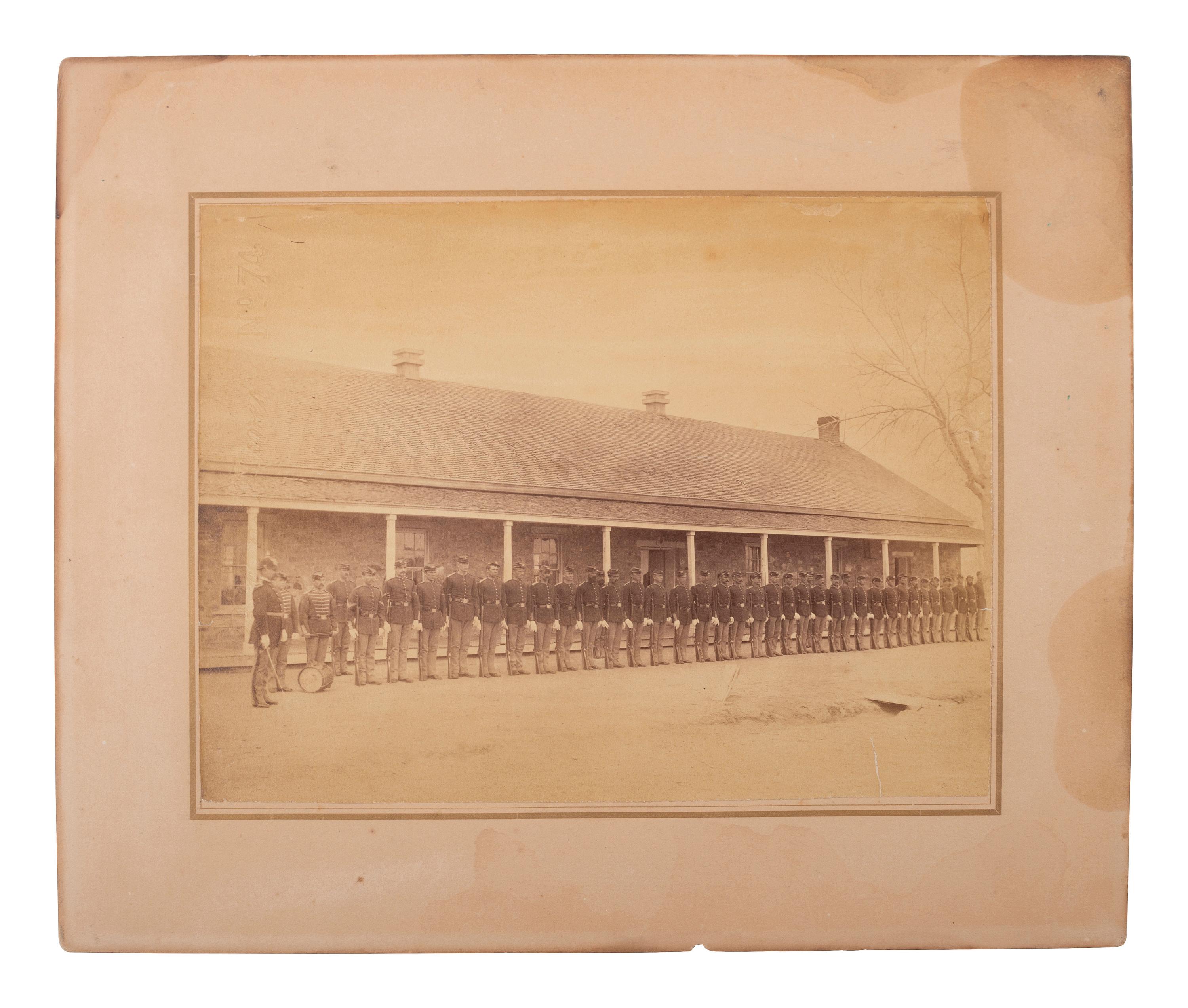 [LATE INDIAN WARS]. [MCKAY, William, photog., attrib.]. 2 photographs of US soldiers near barracks.