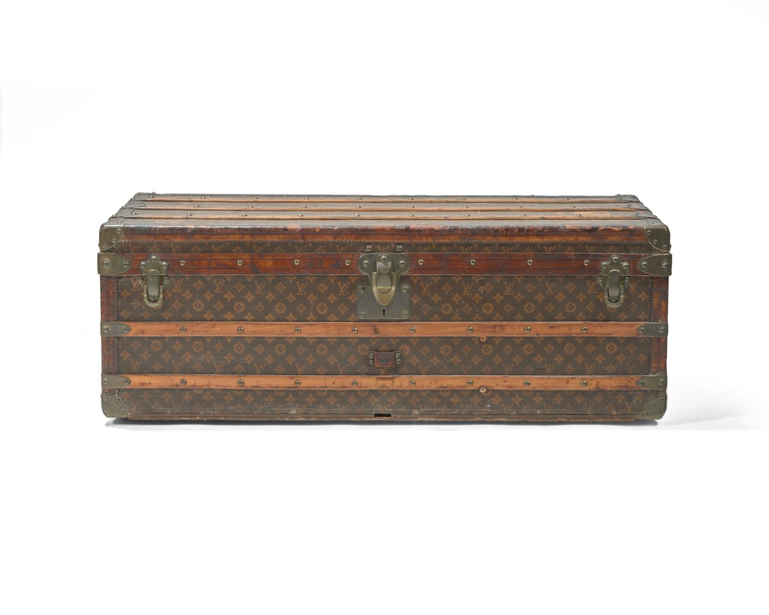 A Louis Vuitton Monogrammed Canvas Hardsided Trunk with 'JG' Monogram
