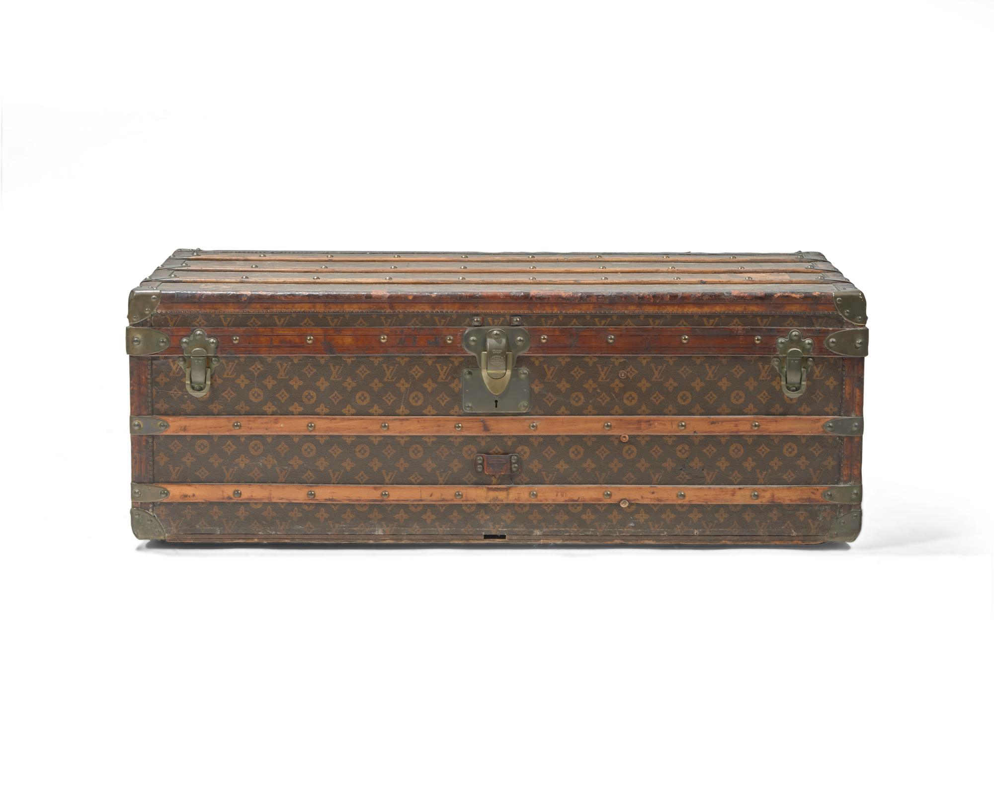A Louis Vuitton Monogrammed Canvas Hardsided Trunk with 'JG' Monogram