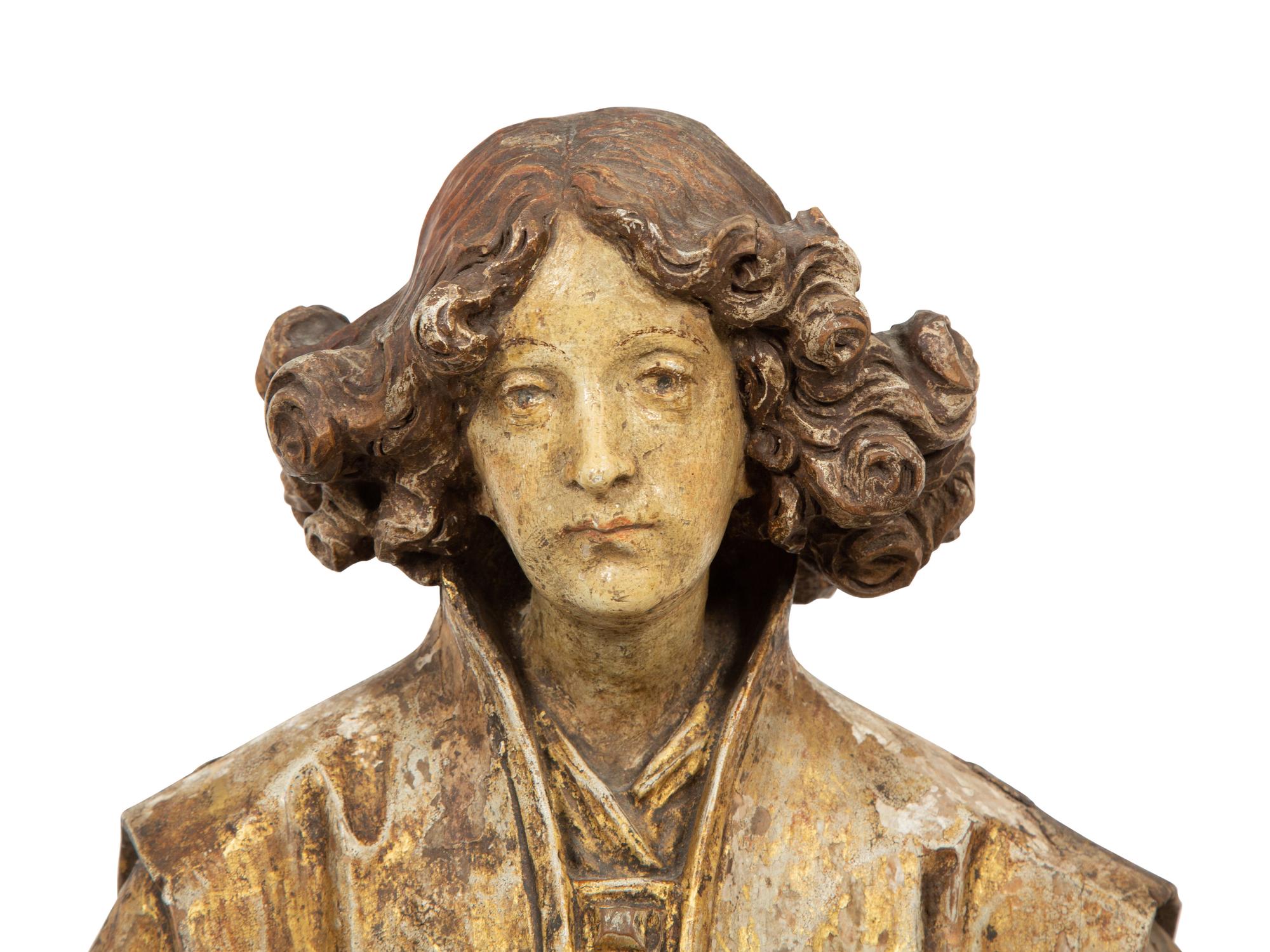 A Continental Carved Polychrome and Gilt Wood Figure