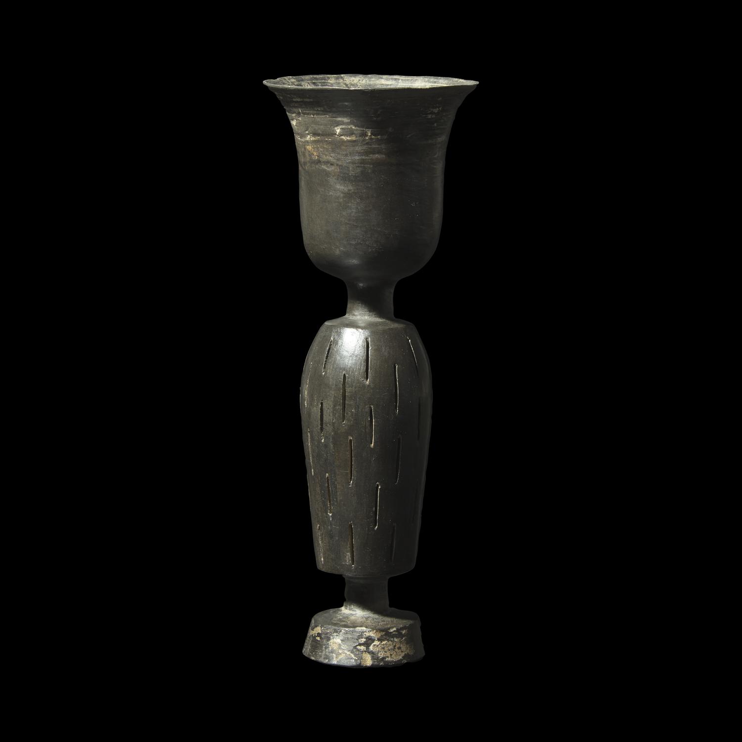 A Chinese Burnished Black 'Eggshell' Pottery Stem Cup, Neolithic Period, Longshan Culture 龍山文化 蛋殼黑陶高柄杯