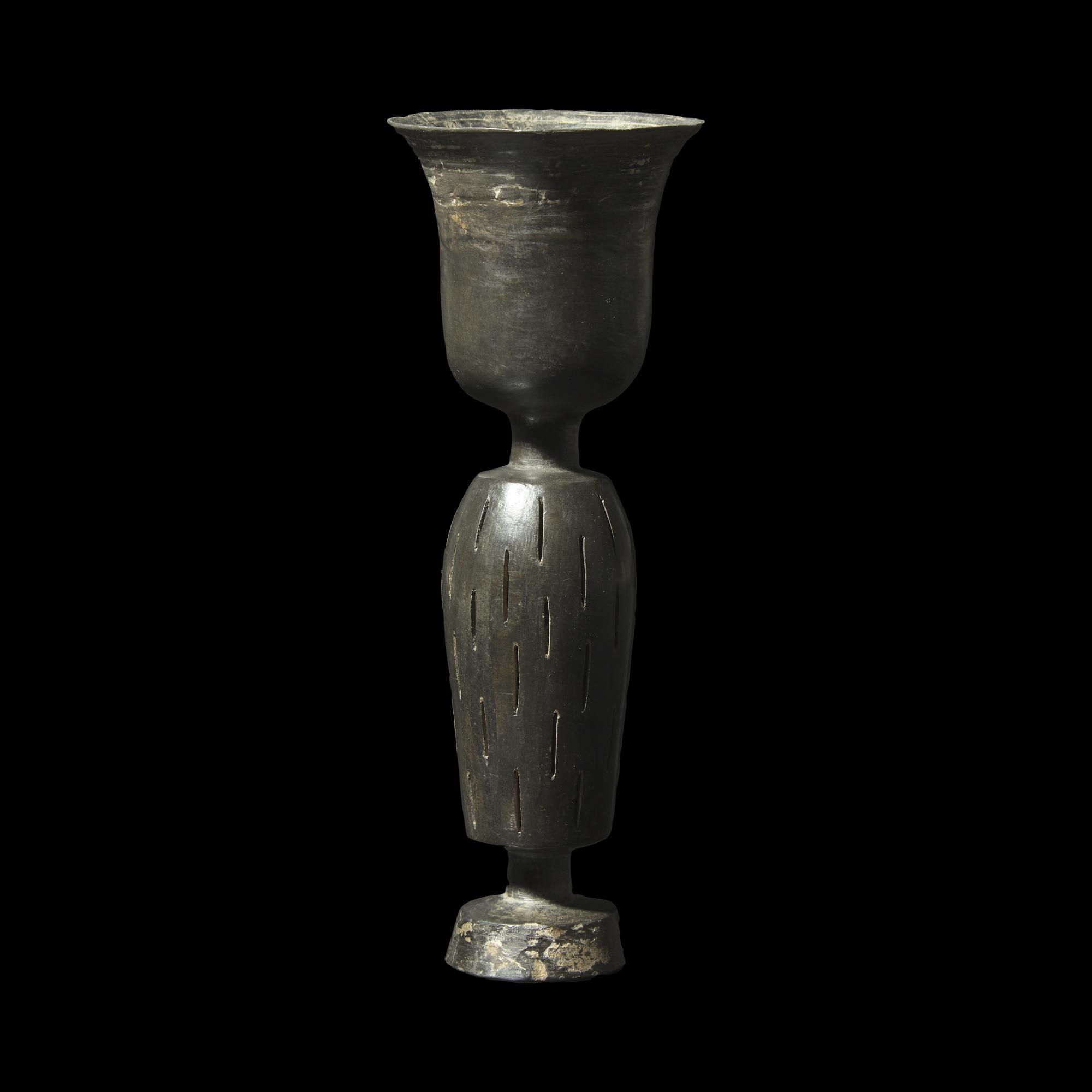 A Chinese Burnished Black 'Eggshell' Pottery Stem Cup, Neolithic Period, Longshan Culture 龍山文化 蛋殼黑陶高柄杯