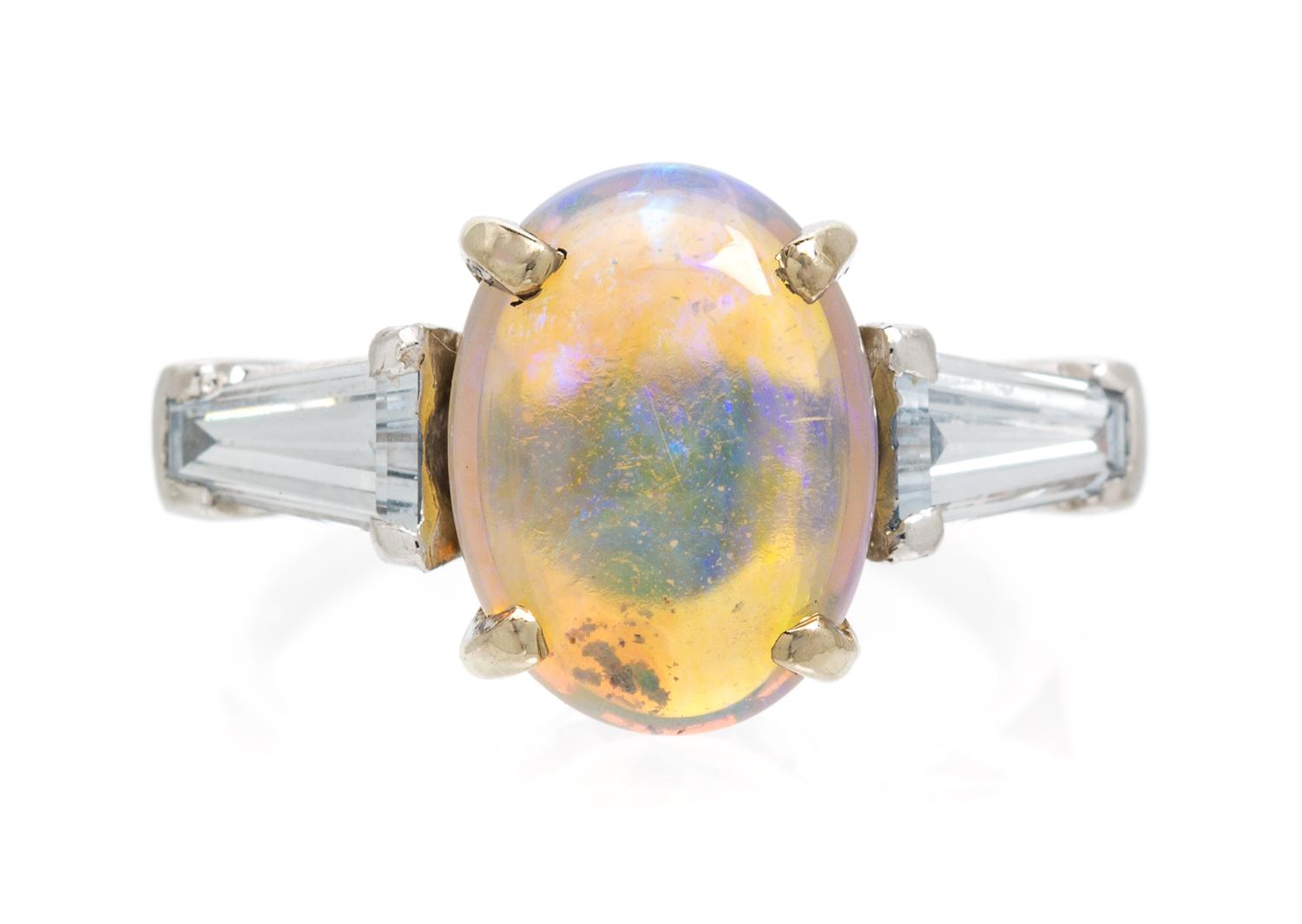 A Platinum, Opal and Diamond Ring, Peacock, 4.20 dwts.