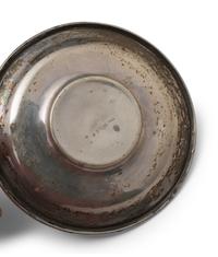 A Set of Twelve American Silver Coffee Cups and Saucers