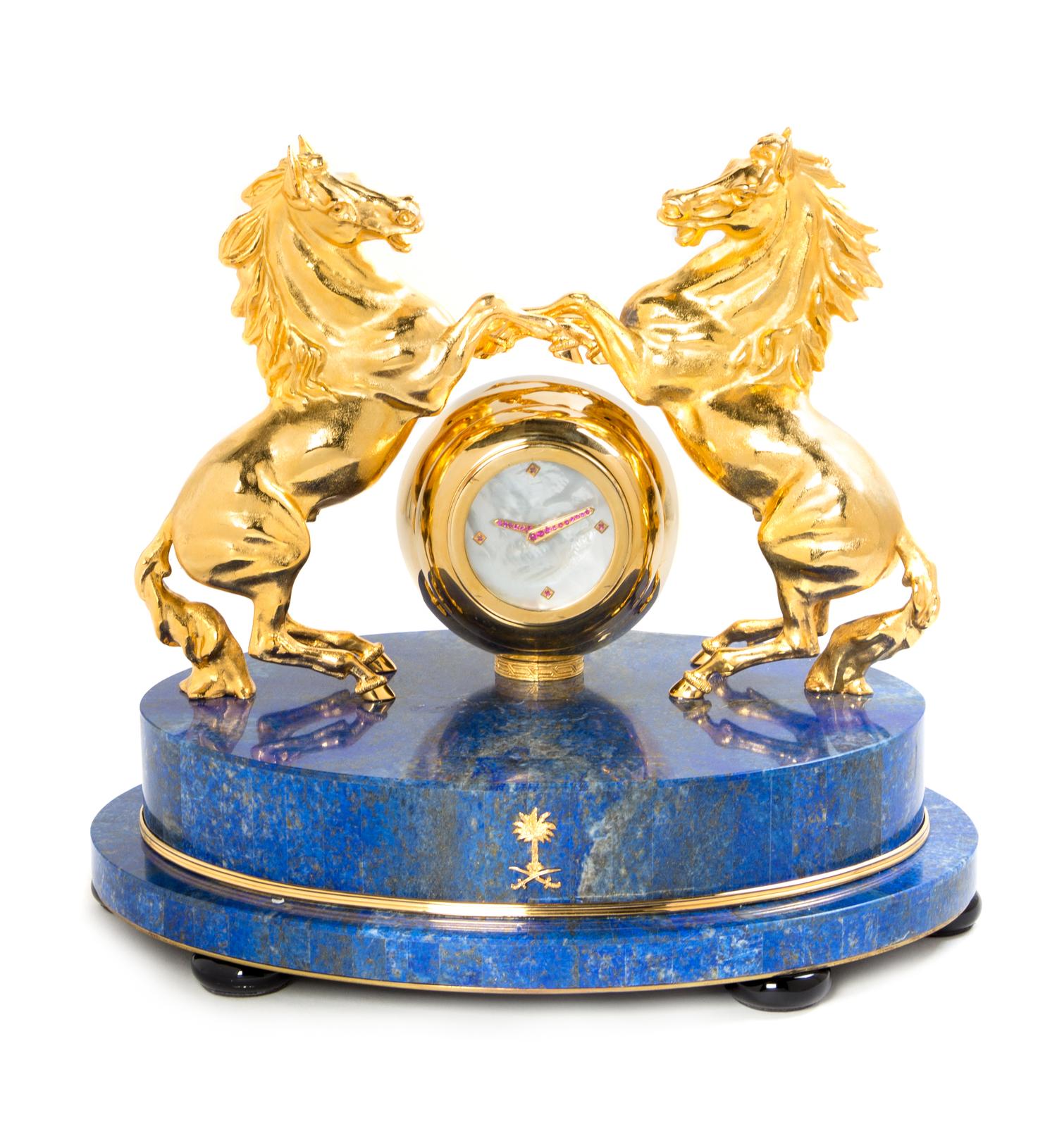 A Gilt Metal and Lapis Lazuli Veneered Clock Height 12 1/2 inches. — MODERN