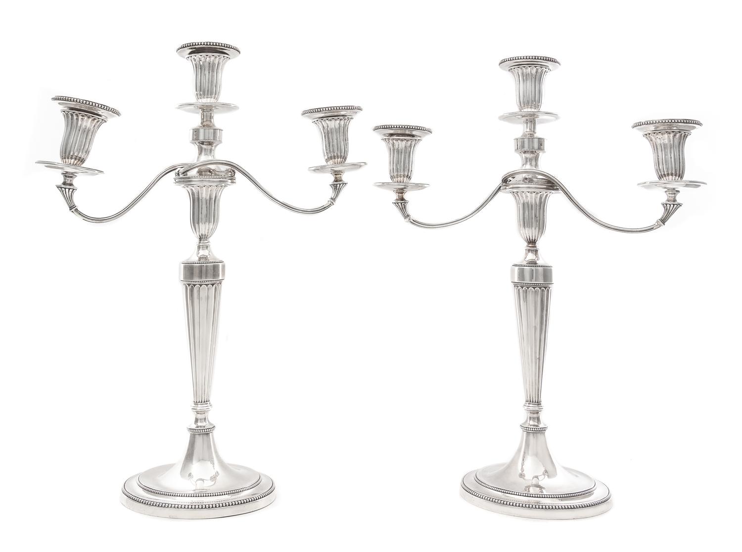 A Pair of George III Silver Three-Light Candelabra, John Schofield, London, 1781; the Branches Marked for 1796, each fluted tapering st