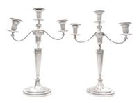 A Pair of George III Silver Three-Light Candelabra, John Schofield, London, 1781; the Branches Marked for 1796, each fluted tapering st
