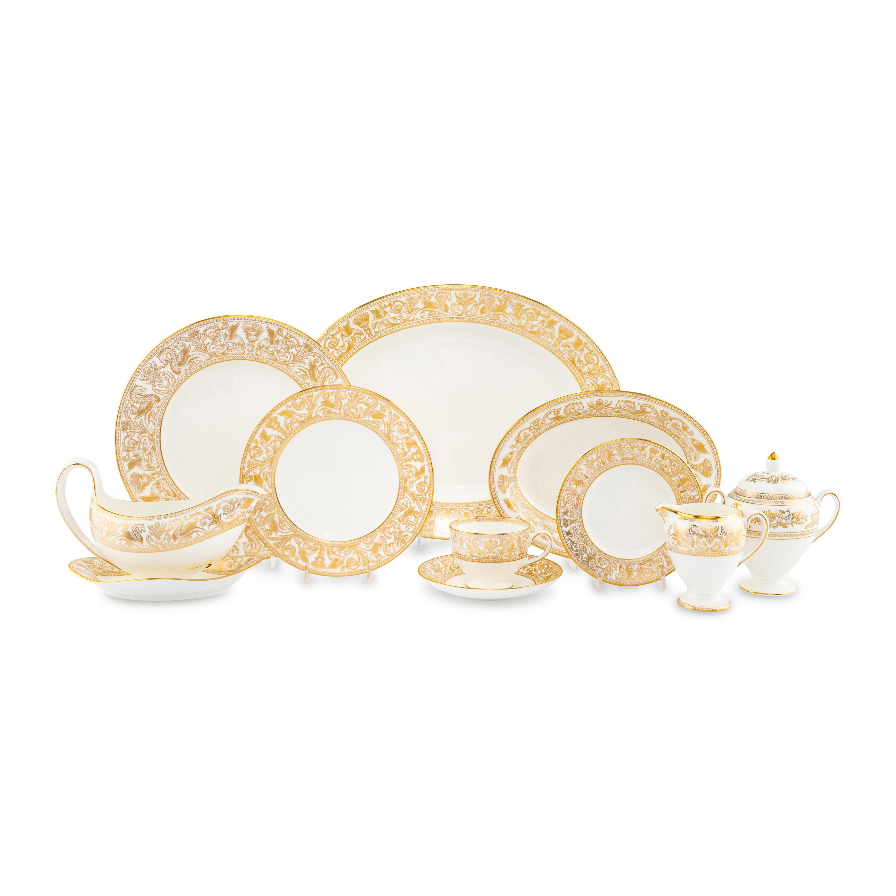A Wedgwood Gold Florentine Porcelain Dinner Service