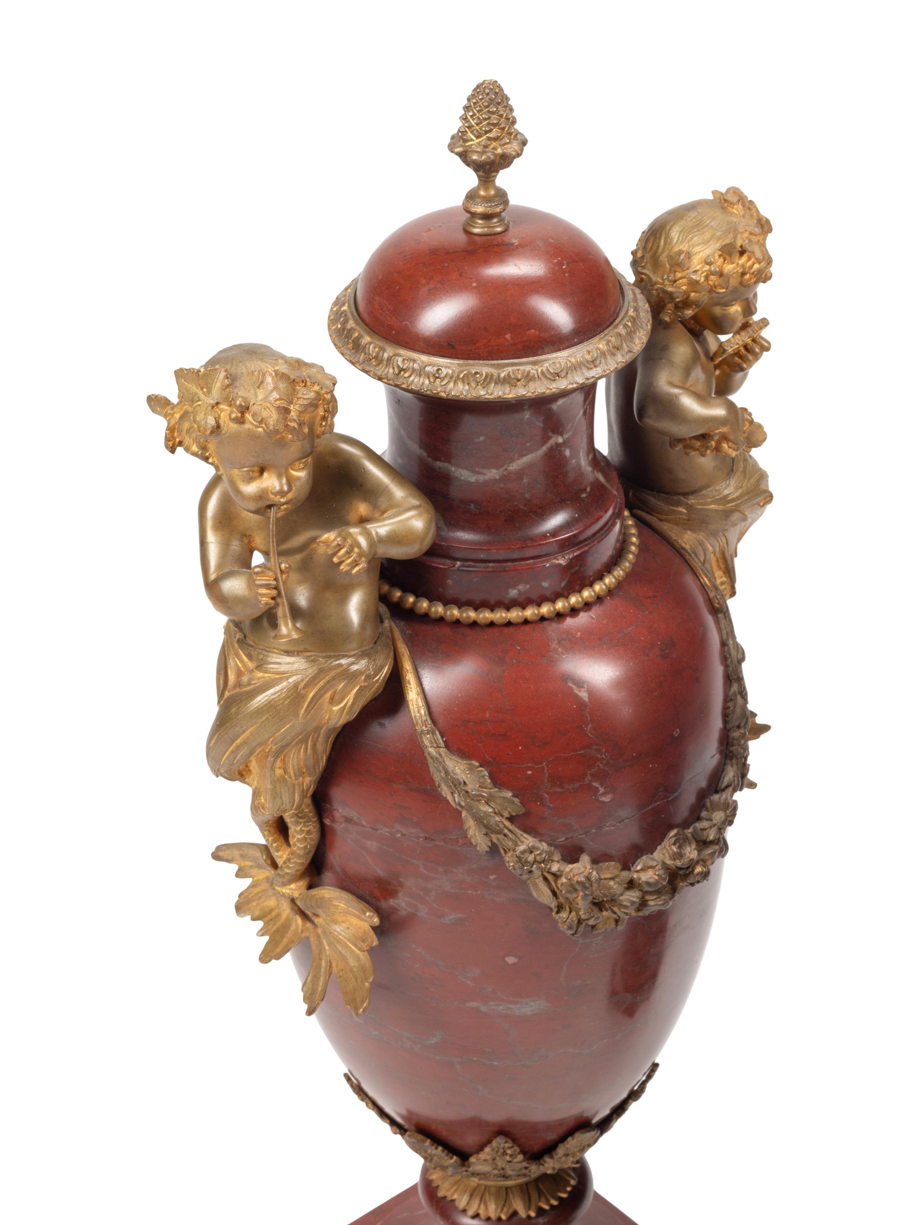 A Pair of Napoleon III Gilt Bronze Mounted Rouge Griotte Marble Urns
