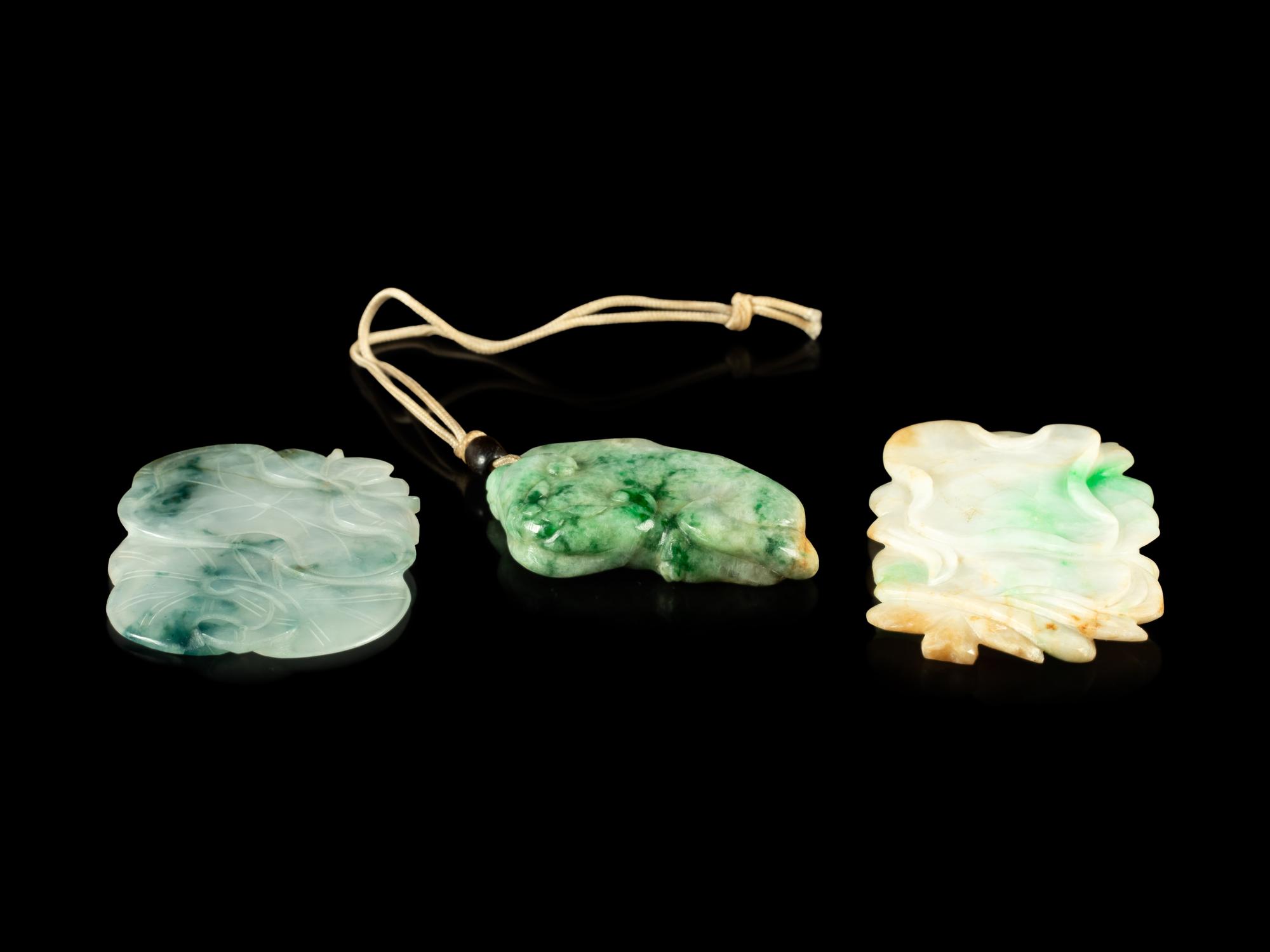 Three Chinese Carved Jadeite Pendants