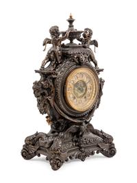 An Ansonia Lydia Patinated Metal Figural Mantel Clock
