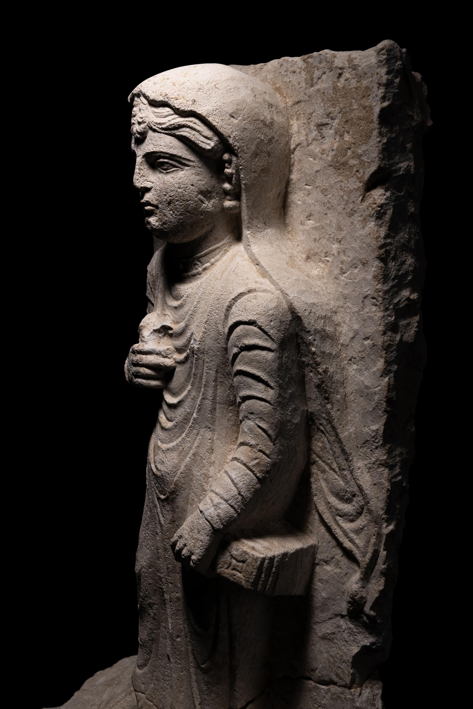 A Palmyran Limestone Relief of a Woman