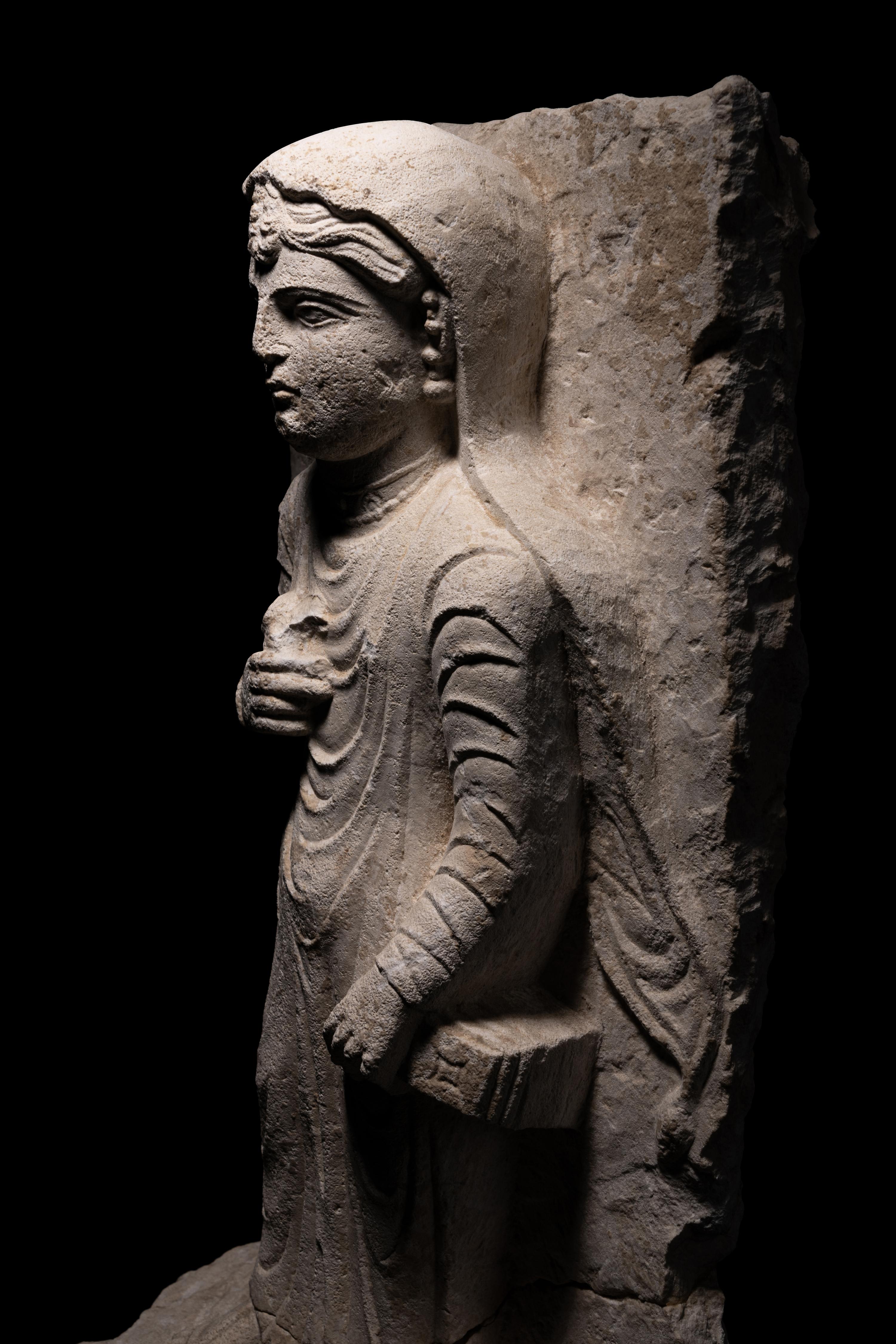 A Palmyran Limestone Relief of a Woman