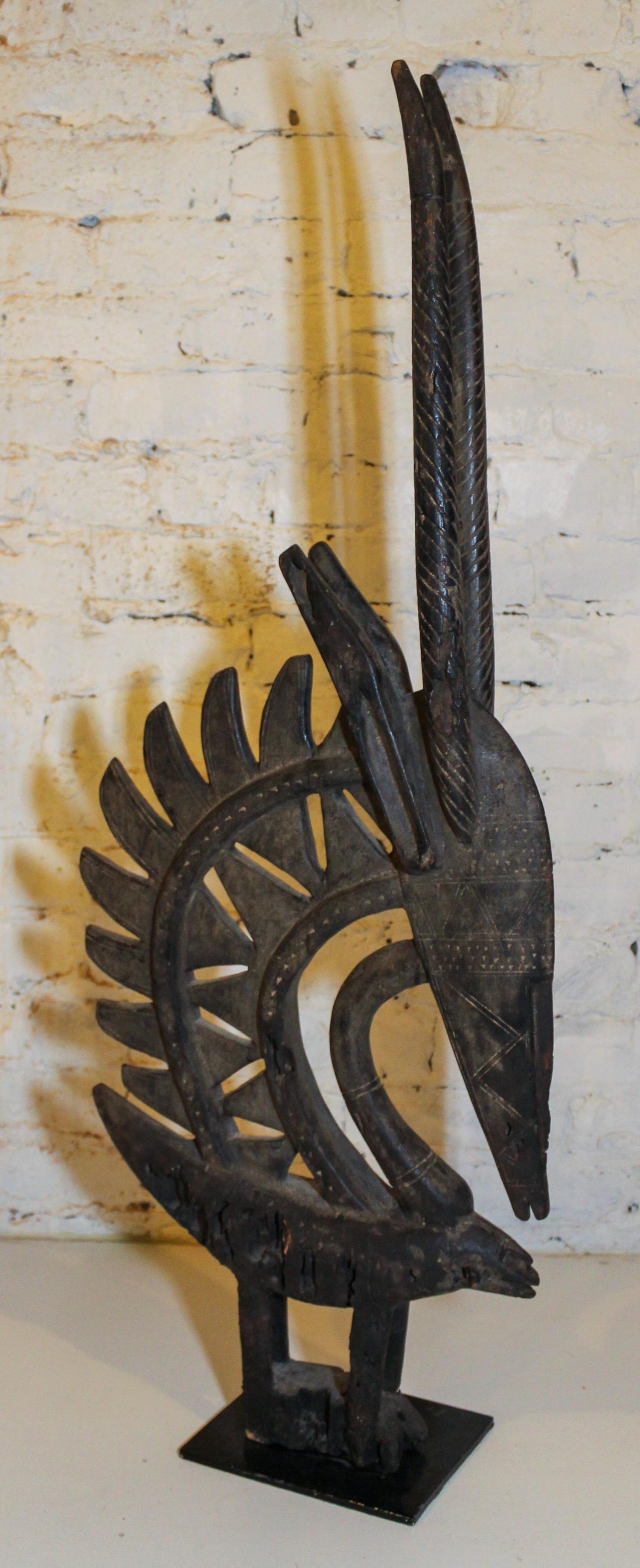A Bambara Chi Wara Headdress. Height 38 1/4 inches.