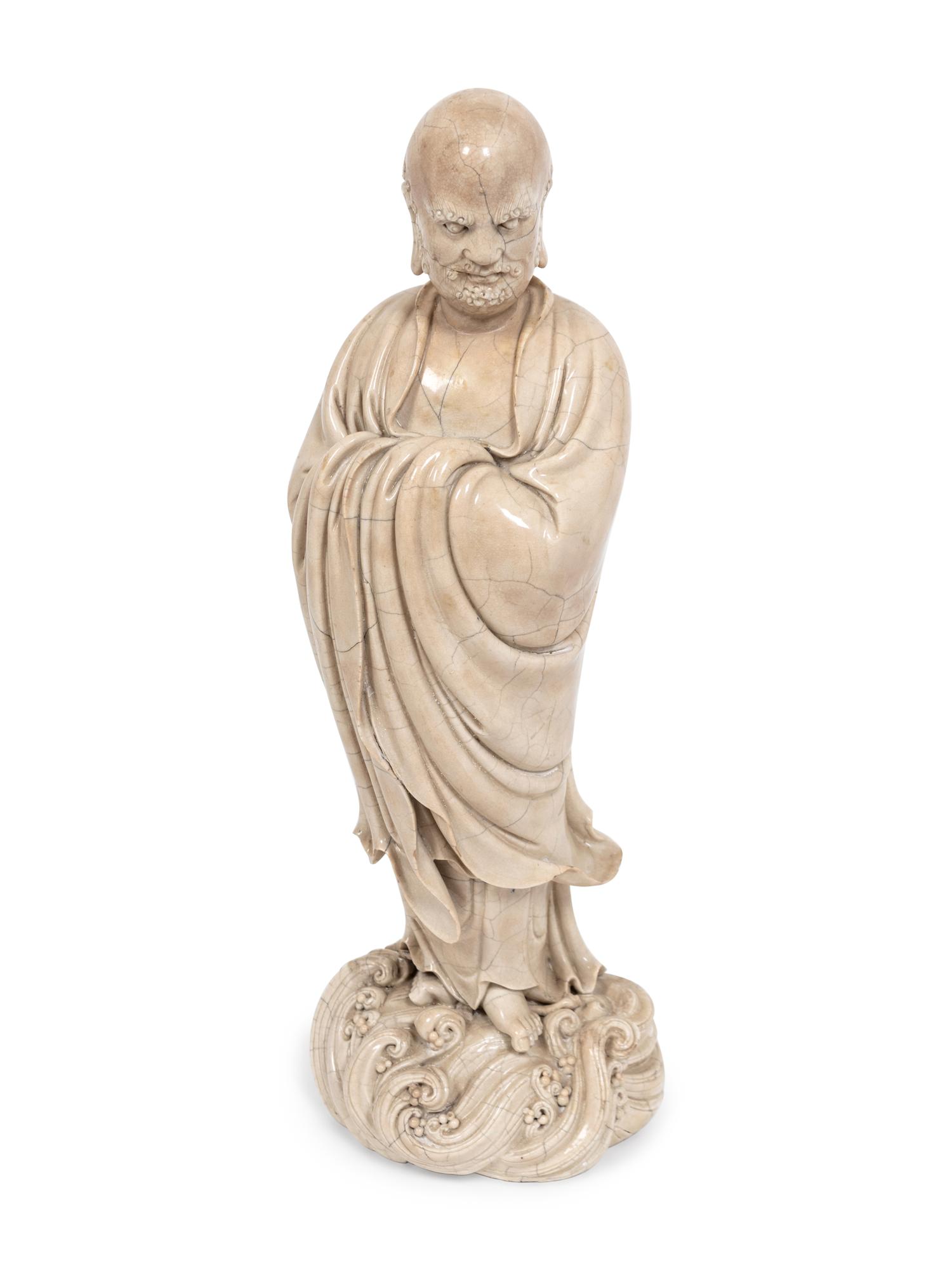 A Chinese Blanc de Chine Porcelain Figure of a Lohan