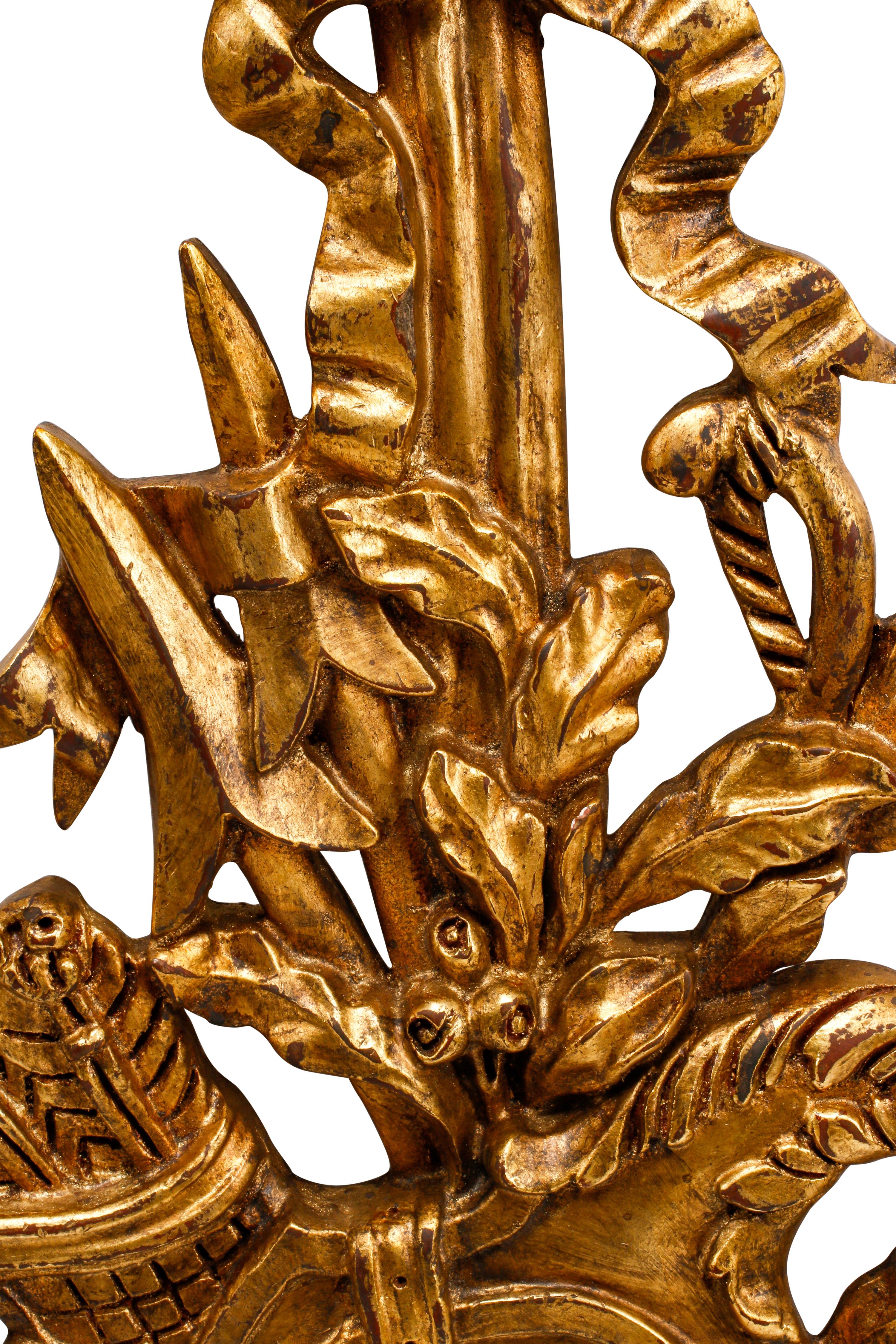 A Set of Four Louis XV Style Giltwood Trophy Plaques