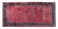 A Sarouk Wool Rug 16 feet 2 inches x 10 feet 6 inches. — FIRST HALF 20TH CENTURY