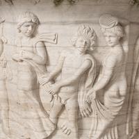 A Monumental Carved Marble Garden Urn and Plinth