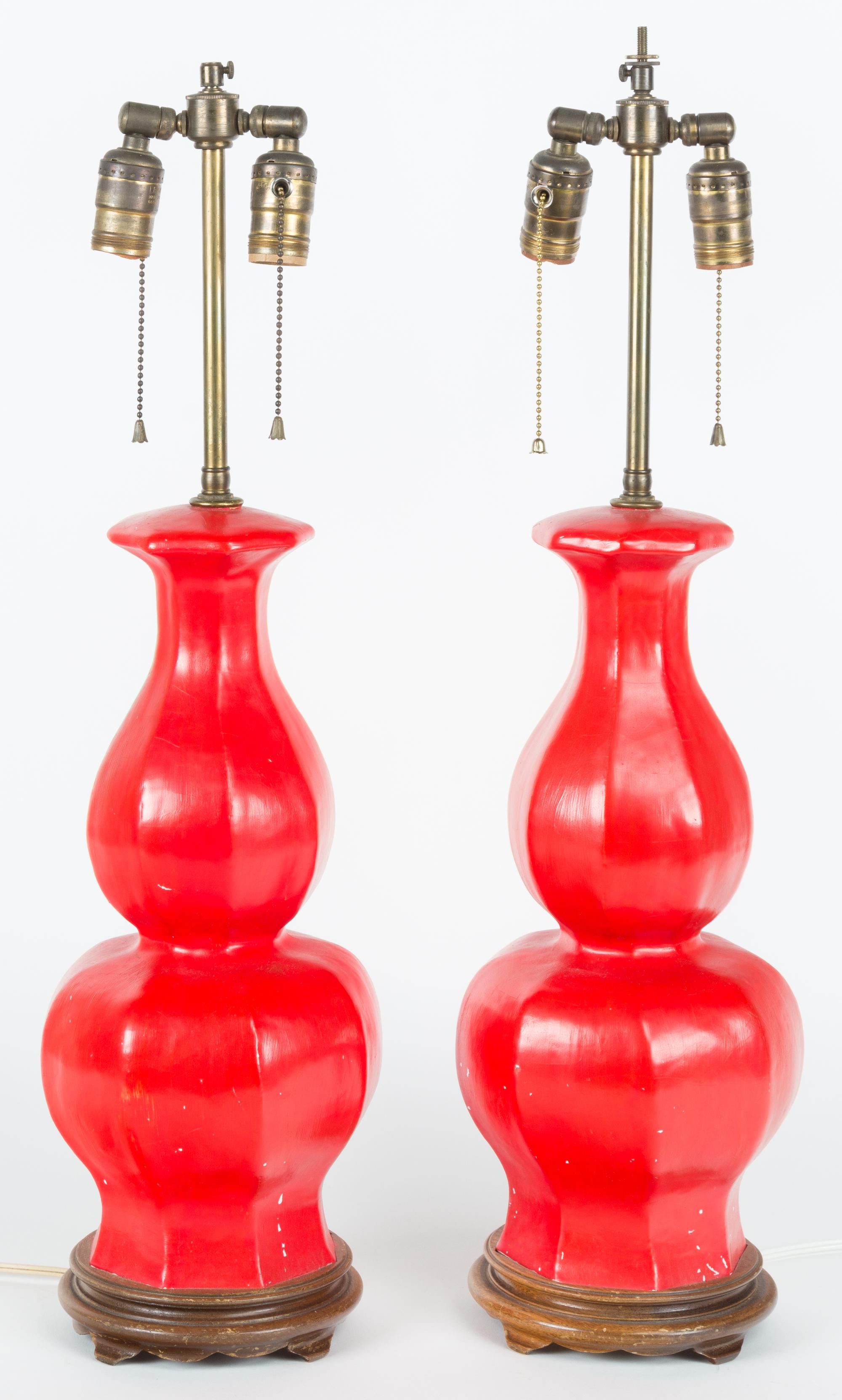 A Pair of Red Painted Urns Height 26 1/2 inches overall. — 20TH CENTURY