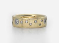 An 18K Yellow Gold Band with Accent Diamonds
