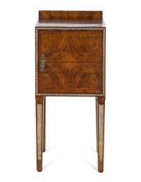 An Art Deco Silvered Metal Mounted Burlwood Nightstand