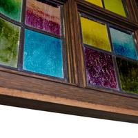 A Stained Glass Transom Window 100" W x 2" D x 25.5" H — United States, Circa 1900
