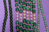 A Group of Chinese Green Hardstone Jewelry
