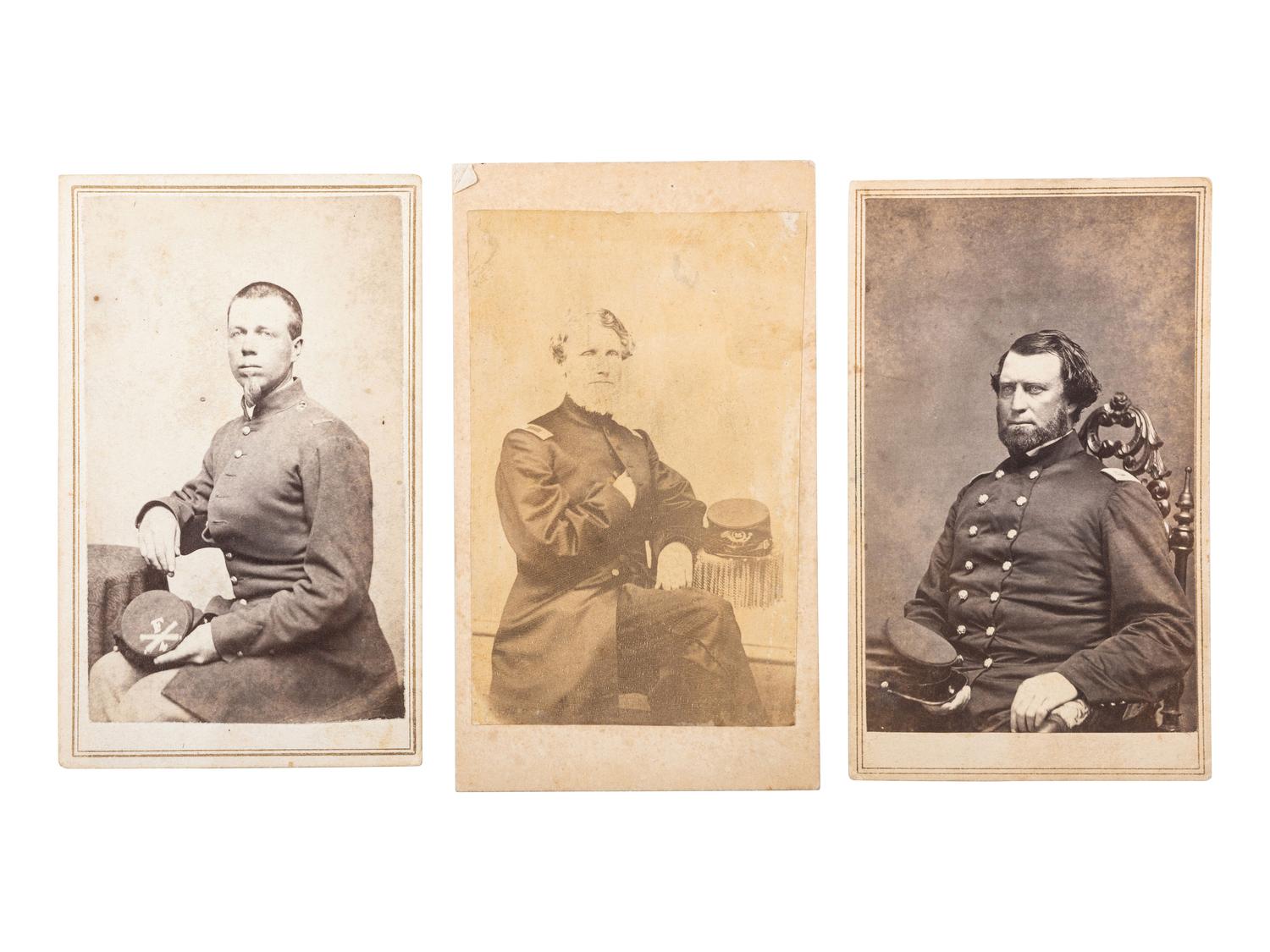 [CIVIL WAR]. CDV album containing 3 portraits of soldiers, highlighted by studio portrait of Brevet Brigadier General and Congressman Aaron Fletcher Stevens, including: