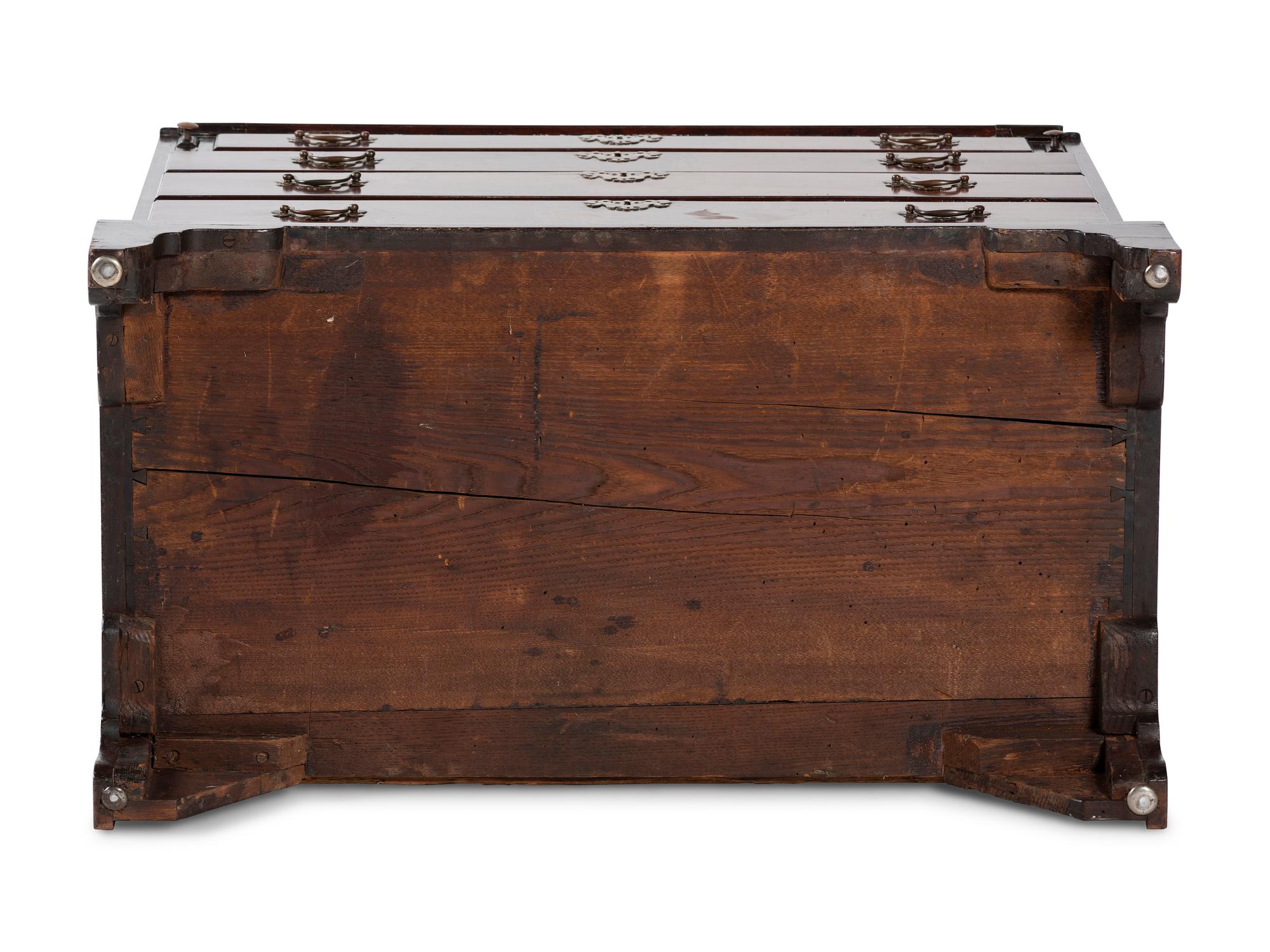 A Chippendale Figured and Shell-Carved Mahogany Slant Front Desk