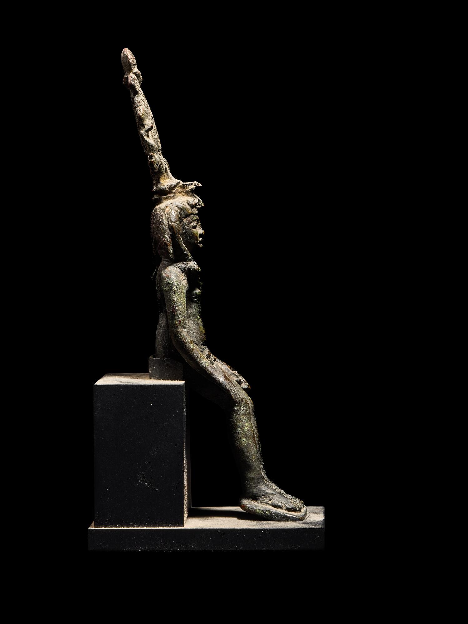 An Egyptian Bronze Seated Harpocrates