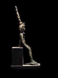 An Egyptian Bronze Seated Harpocrates