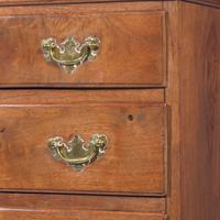 A Queen Anne Carved Walnut Chest-on-Frame