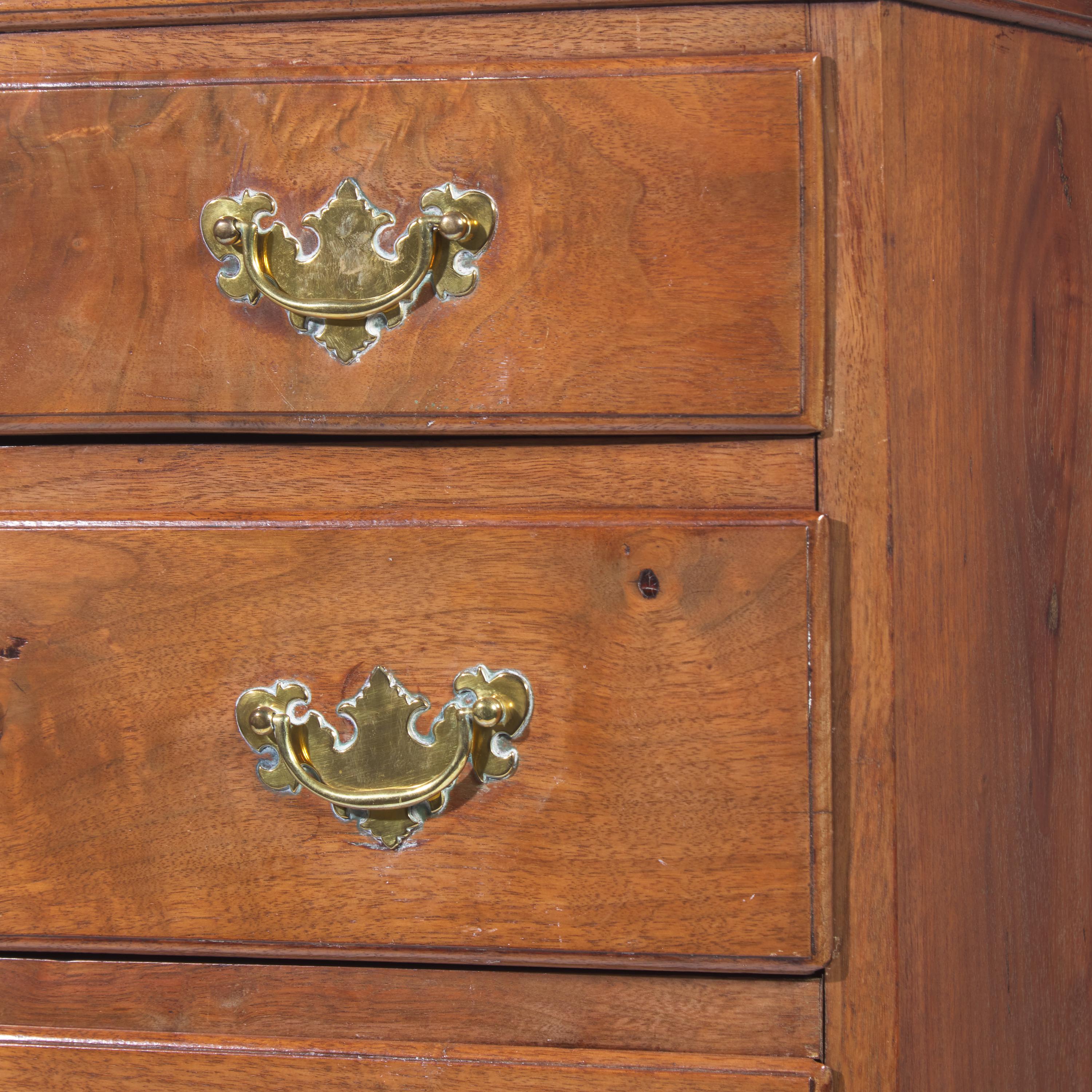 A Queen Anne Carved Walnut Chest-on-Frame