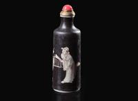 A Chinese black-ground porcelain snuff bottle, Daoguang mark and of the period 黑釉鼻煙壺 道光款 清 道光