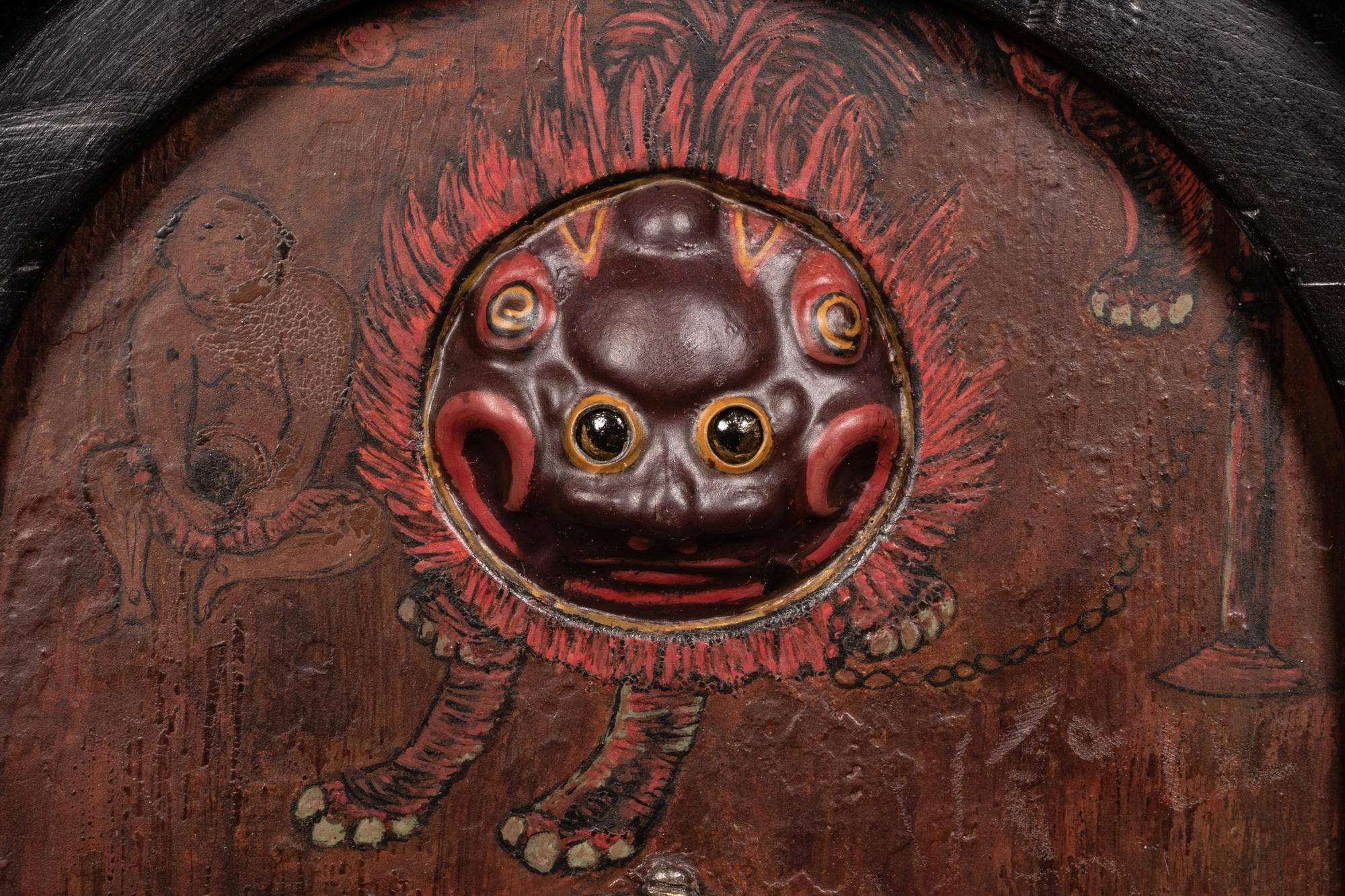 A Japanese Ebonized Cased Lantern Clock with Gourd-Form Weight