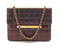 A Chanel Iridescent Purple Quilted Flap Bag, 8 x 6 x 1 inches.