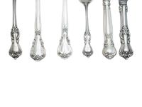 An Assorted Set of American Silver Flatware — 20th Century