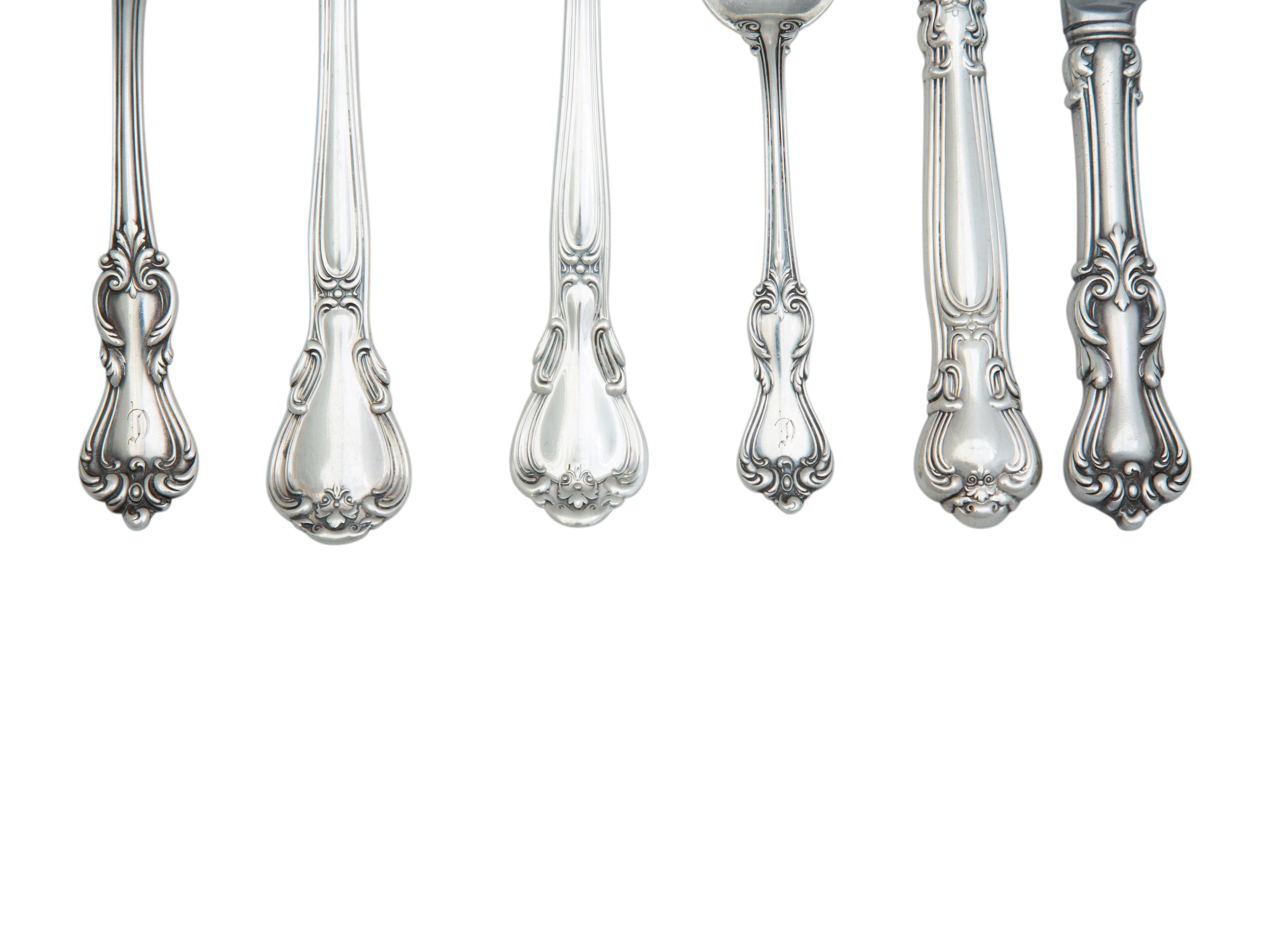 An Assorted Set of American Silver Flatware — 20th Century