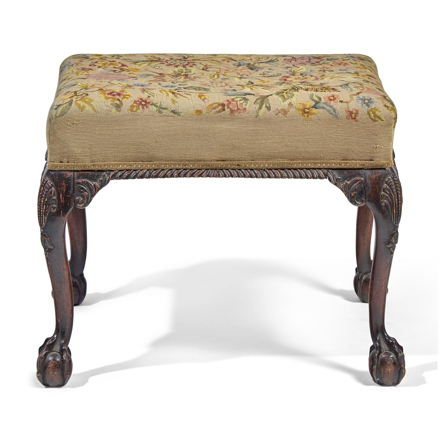 A George III Style Carved Mahogany Stool with Needlepoint Upholstery