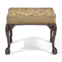 A George III Style Carved Mahogany Stool with Needlepoint Upholstery