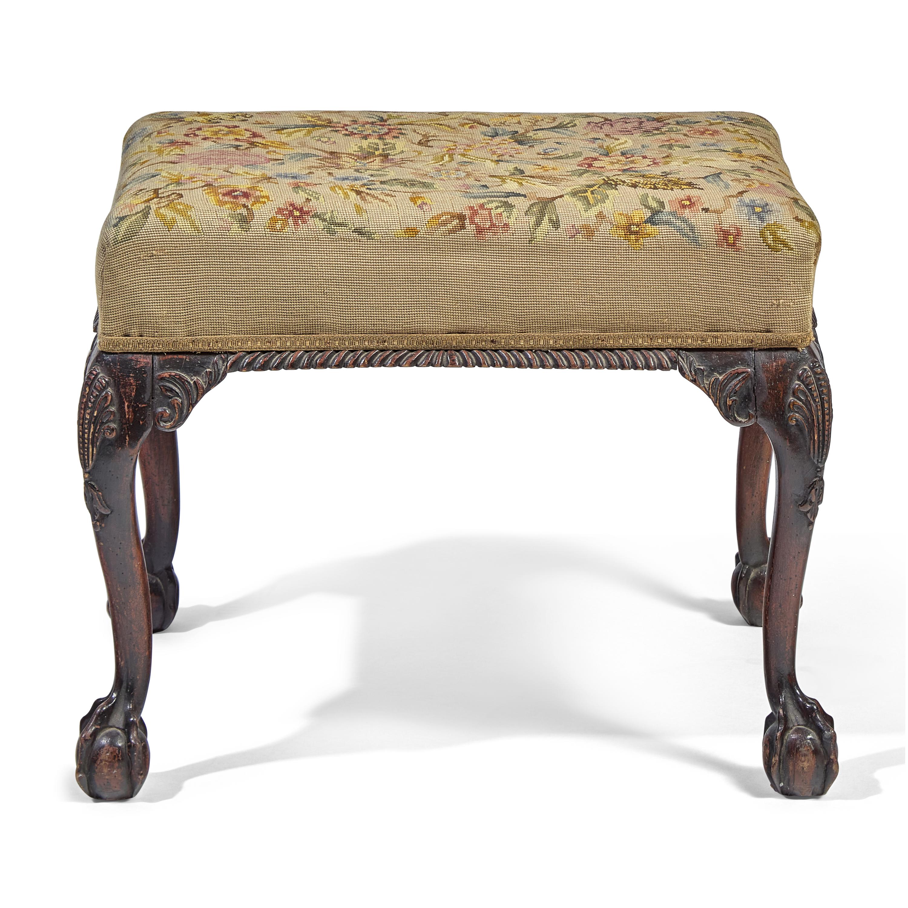 A George III Style Carved Mahogany Stool with Needlepoint Upholstery