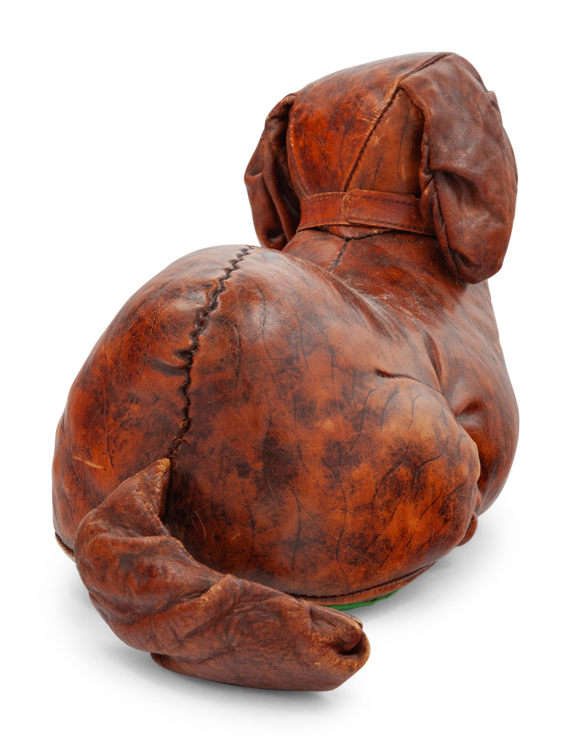 An Omersa & Co. Leather ‘Puppy’ Foot Stool
