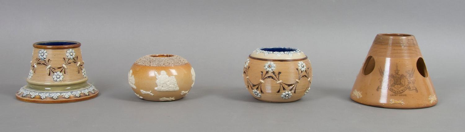 A Group of Four Doulton Match Strikes, Height of tallest 3 3/4 inches.