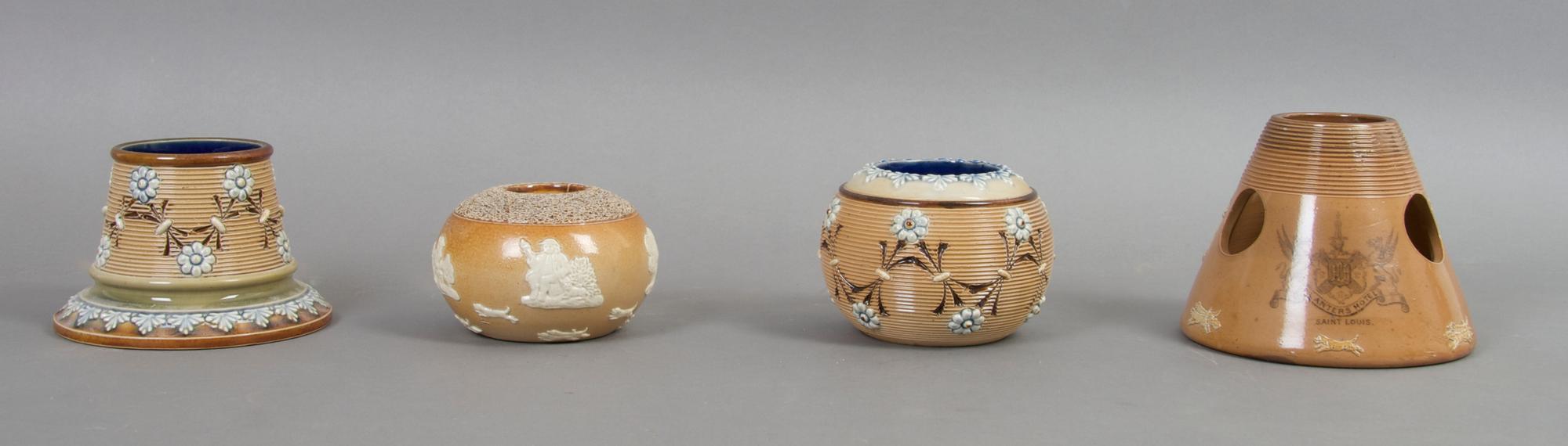 A Group of Four Doulton Match Strikes, Height of tallest 3 3/4 inches.