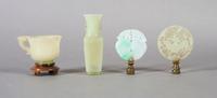 A Group of Four Chinese Jade Carvings, Height of tallest 4 inches.