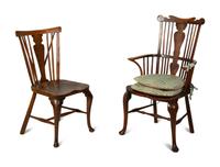 A Set of Eight English Carved Oak Windsor Dining Chairs — 18TH/19TH CENTURY