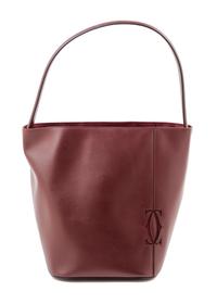A Cartier Burgundy Calfskin Must-C Bucket Bag, 8" x 11" x 7.5"; Handle drop: 9".