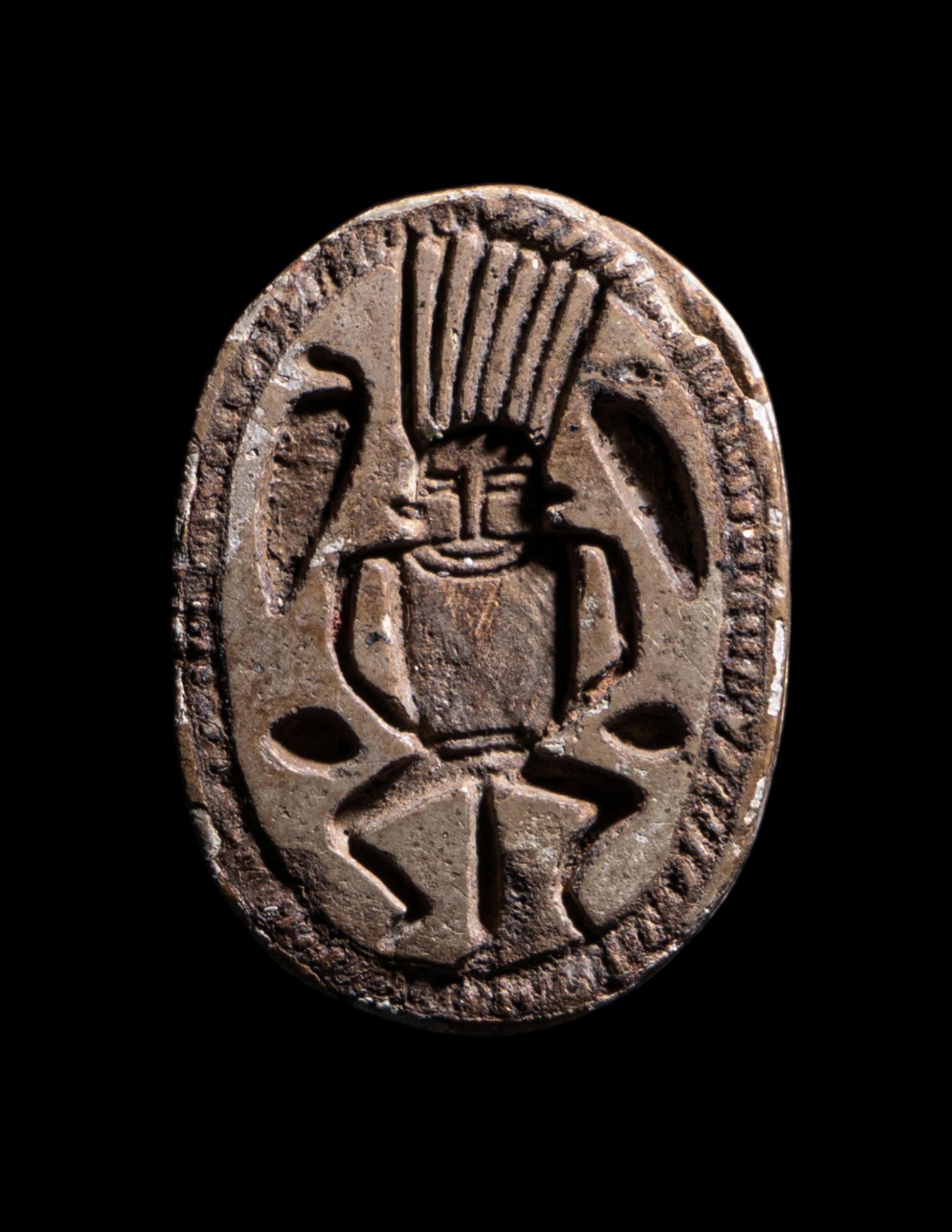 An Egyptian Faience Scarab Bead