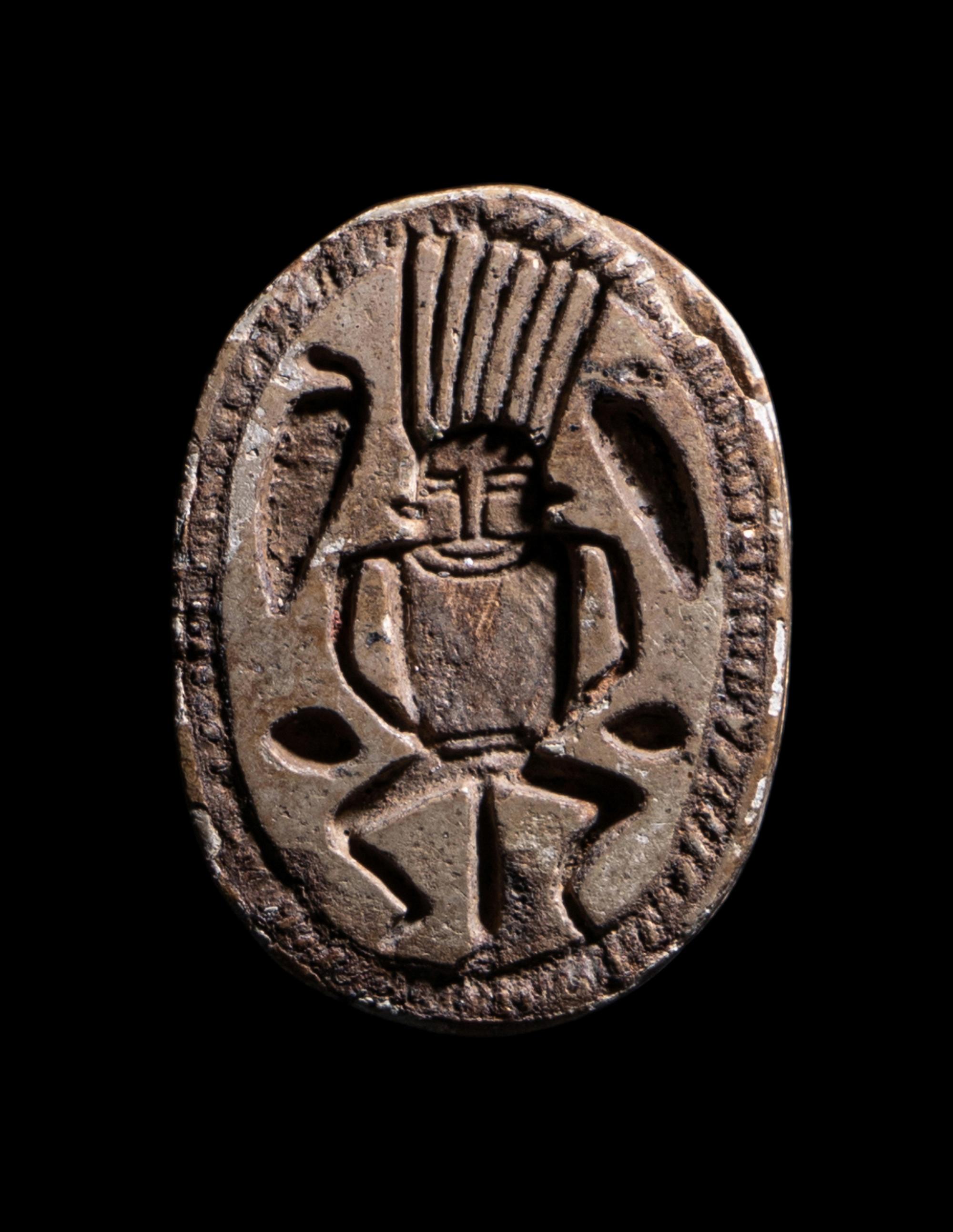 An Egyptian Faience Scarab Bead