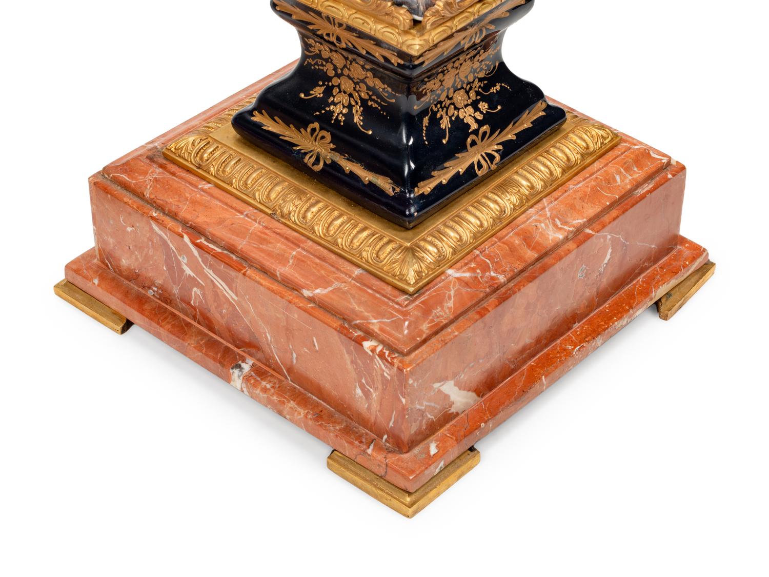 A Pair of Sèvres Style Gilt Bronze Mounted Marble and Transfer-Printed Porcelain Pedestals